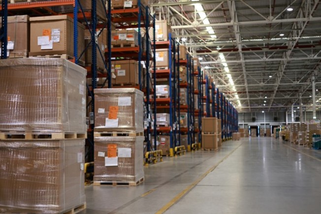 A distribution warehouse with high shelves in Chicago, IL